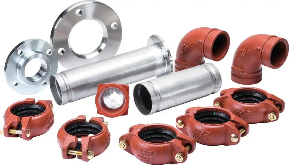 Zusammengestelltes Rohrzubehör für Heizungsanlagen, bestehend aus Flanschen, Rohren, Bogen und Muffen, geeignet für Anwendungen mit Bosch Solewärmepumpen.